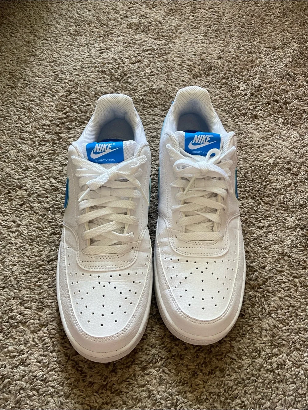 Nike White Low-Top Sneakers with Blue Swoosh